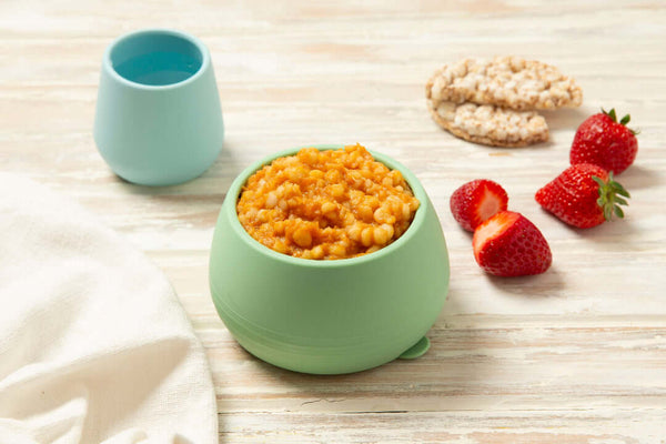 Chicken tagine with pearl cous cous in a baby bowl