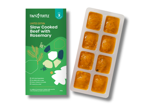 Tiny Turtle baby food package with frozen cube trays on a white background