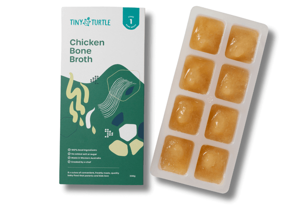 Tiny Turtle Chicken Bone Broth packaging with broth cubes on a white background