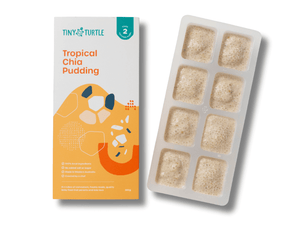 Tropical Chia Pudding packaging and a tray of chia pudding cubes on a white background