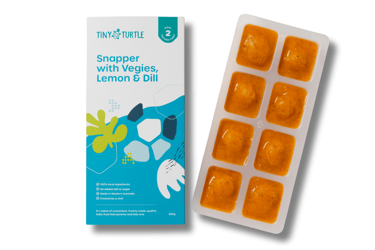 Tiny Turtle snack packaging with orange snack shapes and a blue label on a white background