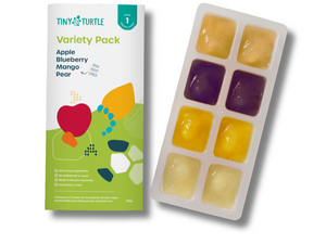 Tiny Turtle variety pack with colorful fruit-shaped ice cube trays on a white background