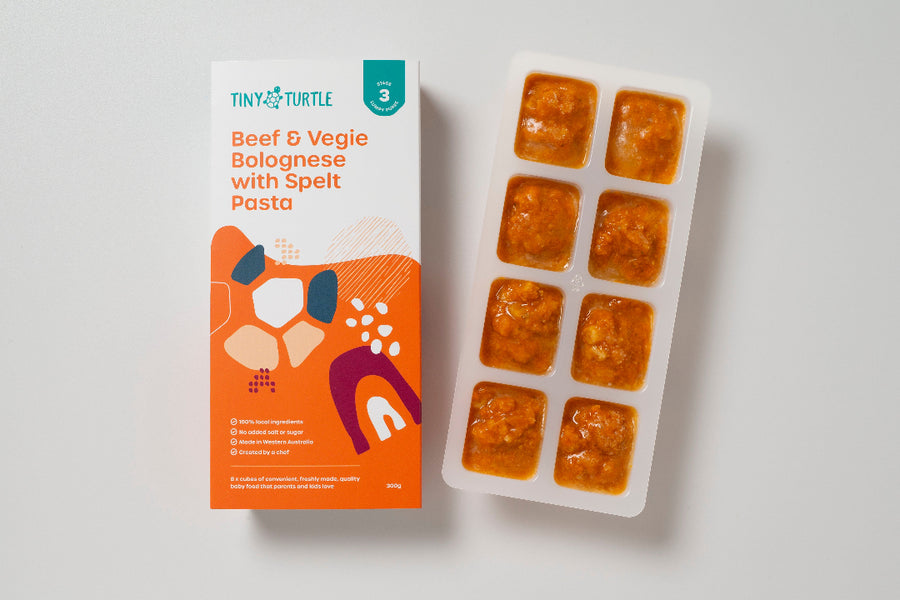 Stage 3 beef bolognaise with spelt pasta containing 8 frozen cubes next to packaging 