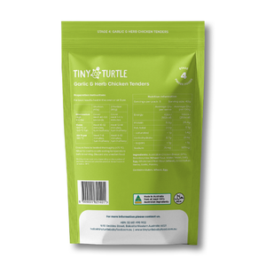 A green stand-up pouch of TINY TURTLE Garlic & Herb Chicken Tenders, showing the back panel with nutritional information, barcode, and a white label at the bottom, set against a plain white background.