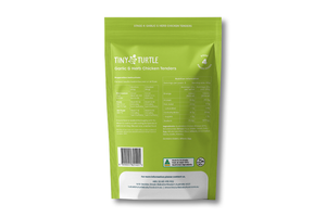 A green stand-up pouch of TINY TURTLE Garlic & Herb Chicken Tenders, showing the back panel with nutritional information, barcode, and a white label at the bottom, set against a plain white background.