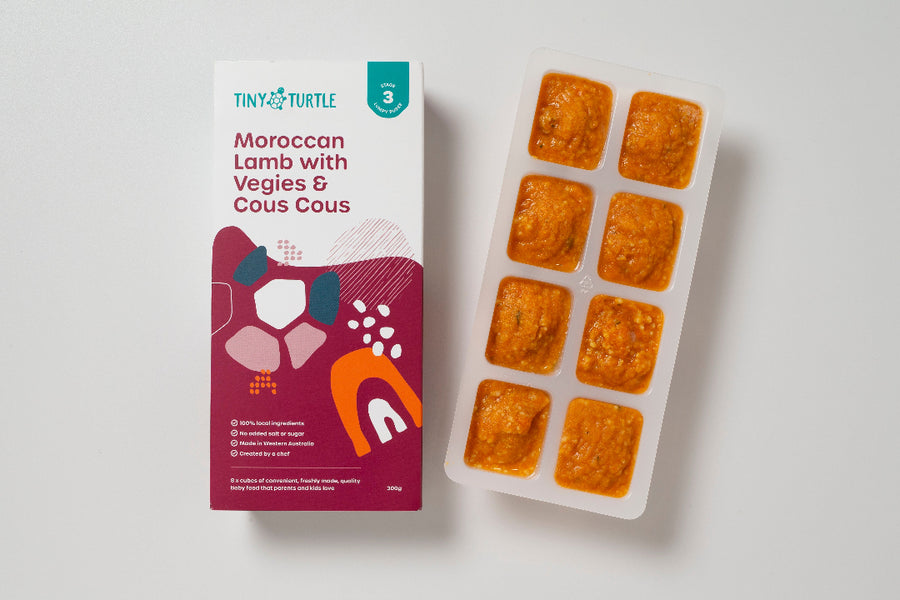 Moroccan Lamb stage 3 baby puree with 8 frozen cubes next to packaging