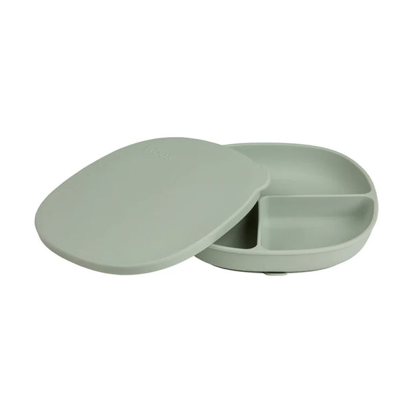 Bbox silicone plate with lid in soft green, featuring three divided sections for toddler meals and snacks.