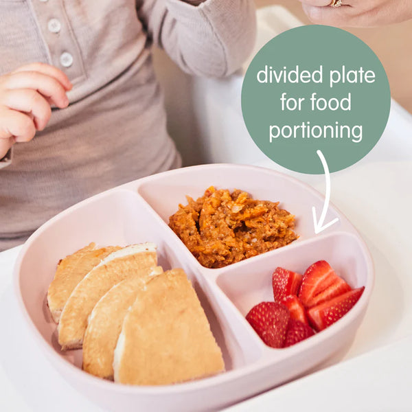 Silicone divided plate showcasing snacks and strawberries, perfect for baby food portioning.