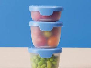 Bbox Snack Tubs stacked with veggies and fruits, featuring leakproof lids and removable silicone seals for easy use.