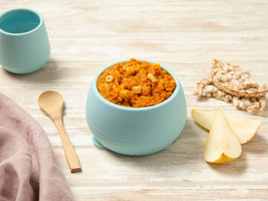 Baby bowl containing stage 3 beef bolognaise with spelt pasta with baby cup and pear
