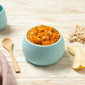 Baby bowl containing stage 3 beef bolognaise with spelt pasta with baby cup and pear