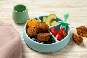 Blue baby bowl with Tiny TurtleCarrot Banana and chia muffins, strawberries and avocado. 