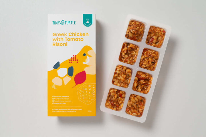 Tiny Turtle Greek Chicken with Tomato Risoni baby food with packaging and tray of 8 frozen portions