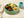 Tiny Turtle Pear Blueberry Muffin on a plate with cheese and mandarin
