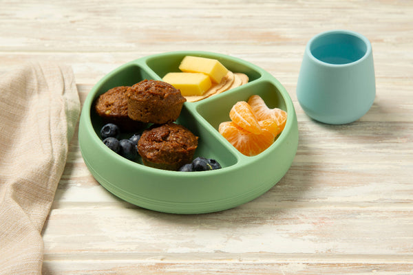 Tiny Turtle Pear Blueberry Muffin on a plate with cheese and mandarin