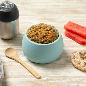 Blue bowl containing toddler meal lamb and lentil pilaf rice