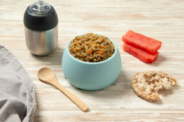 Blue bowl containing toddler meal lamb and lentil pilaf rice