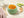 Moroccan lamb and cous cous baby puree in a green bowl 