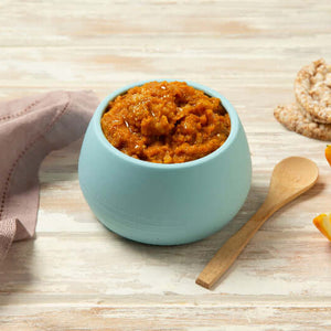 *NEW* Snapper Tikka Masala in a blue bowl with orange slices and rice cakes, ideal for babies aged 10 months and older.