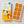 Load image into Gallery viewer, Summer Mango Chicken Stage 3 baby food by Tiny Turtle, featuring lumpy puree in tray next to packaging.
