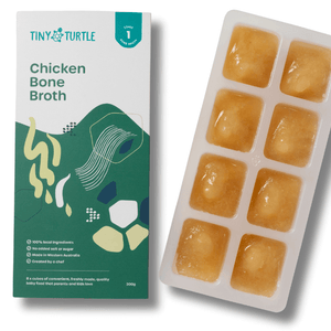 Tiny Turtle Chicken Bone Broth packaging with broth cubes on a white background