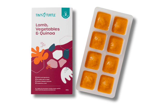 Tiny Turtle baby food packaging with a tray of orange squares on a white background