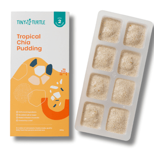Tropical Chia Pudding packaging and a tray of chia pudding cubes on a white background