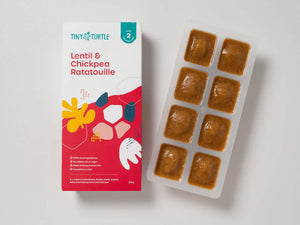 Stage 2 Lentil and Chickpea Ratatouille baby food by Tiny Turtle, featuring 8 frozen puree cubes in tray next to product packaging.